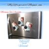 A refrigerator magnet with three pictures of a baby.