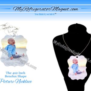 A picture necklace with a baby on it.